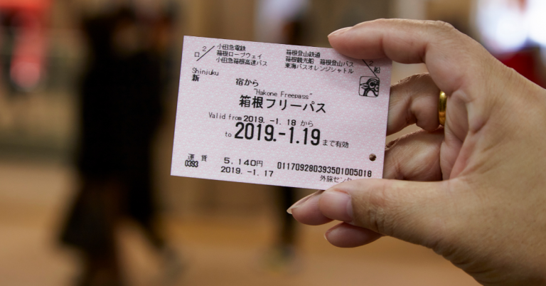 A passenger uses the JR Pass at a platform along the Yamanote Line in Tokyo.